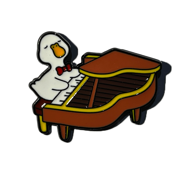 Patito tocando piano