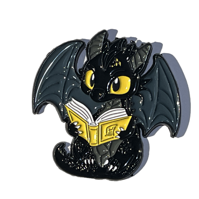 Chimuelo leyendo un libro