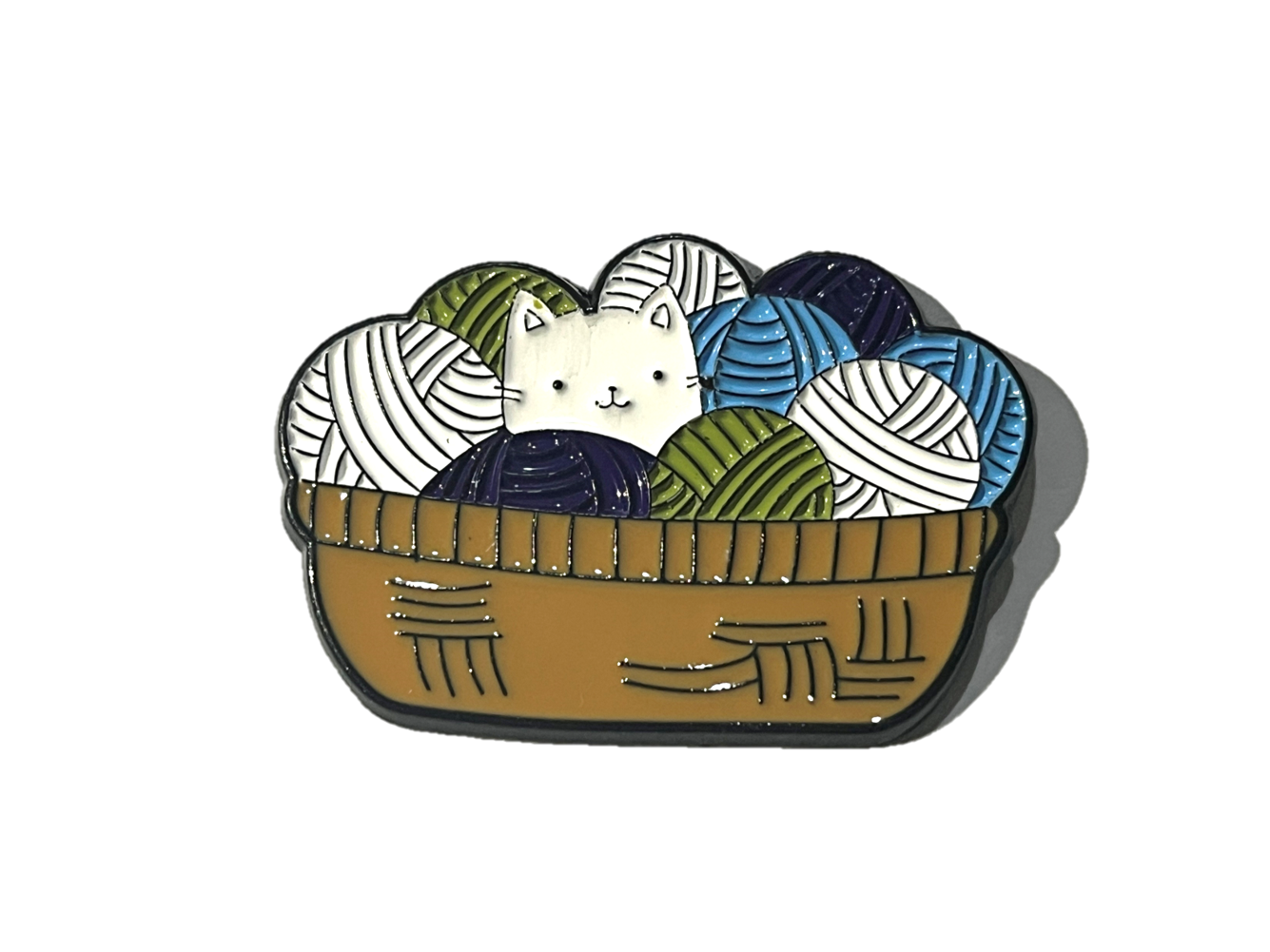 Gato con bolas de lanas