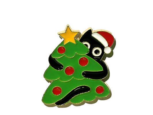 Black cat holding Christmas tree