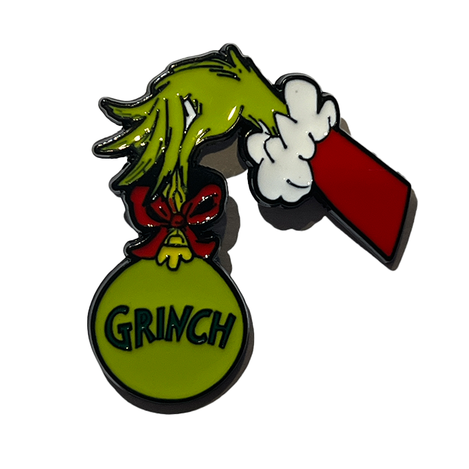 El grinch tomando su esfera navideña