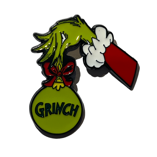 El grinch tomando su esfera navideña