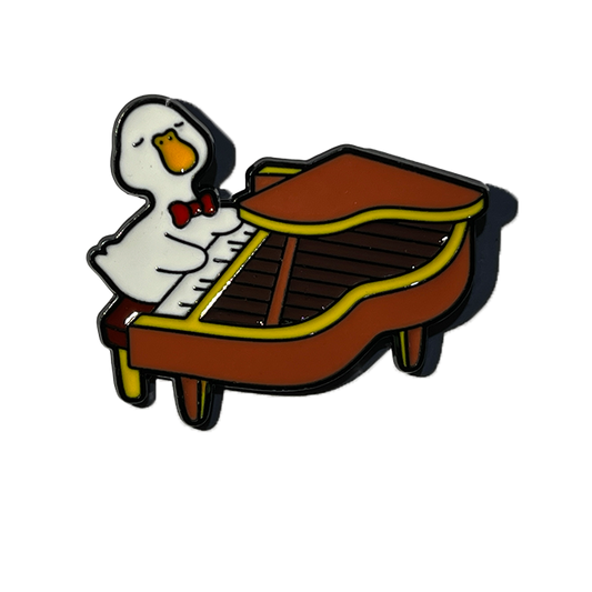 Patito tocando piano